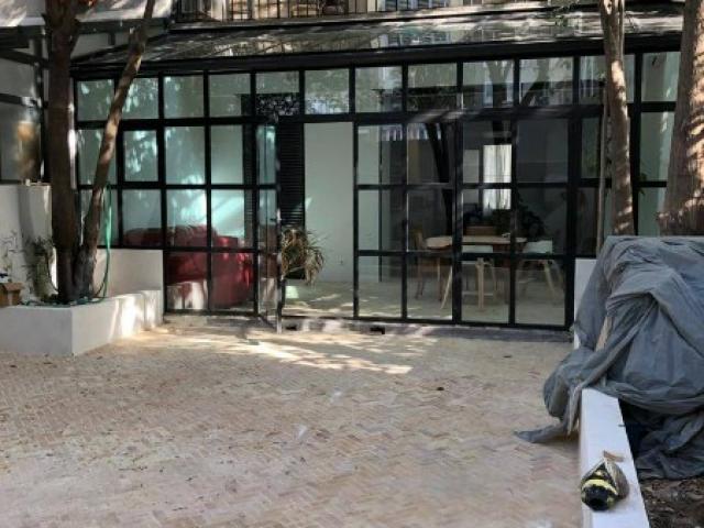 Création d’une véranda avec ouverture sur la pièce à vivre à Marseille