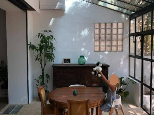 Création d’une véranda avec ouverture sur la pièce à vivre à Marseille